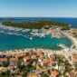 Scenic aerial view of marina and coastline in Rogoznica, Croatia during summer.