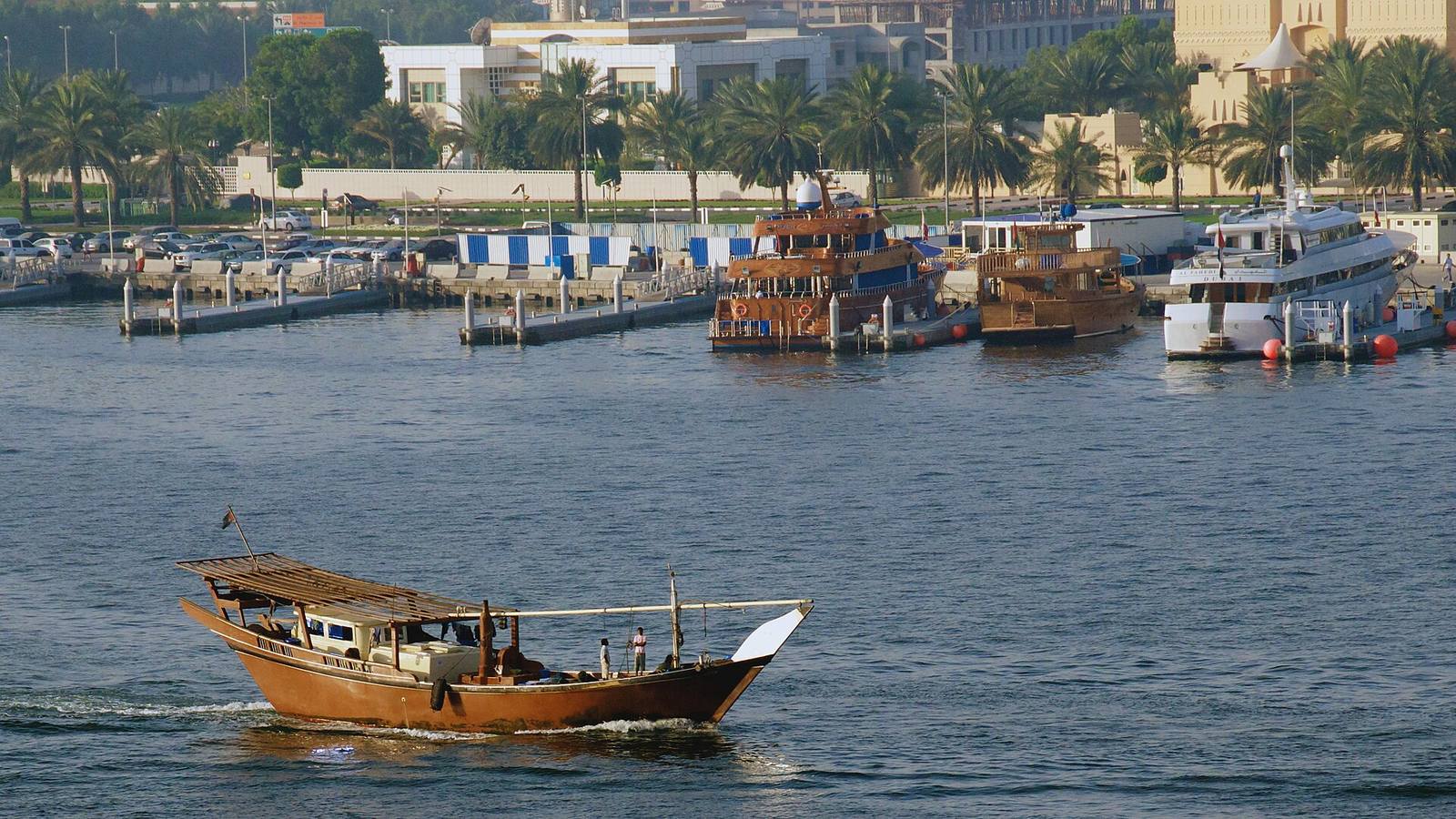 Traditional wooden dhow on Dubai Creek